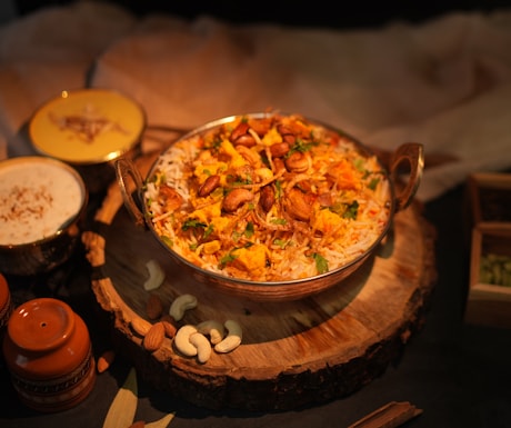 A rich curry served in a copper kadai and finished with fresh herbs