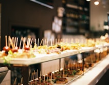 A catering buffet line laid out with an assortment of dishes